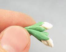 Green clay wrapped around white clay